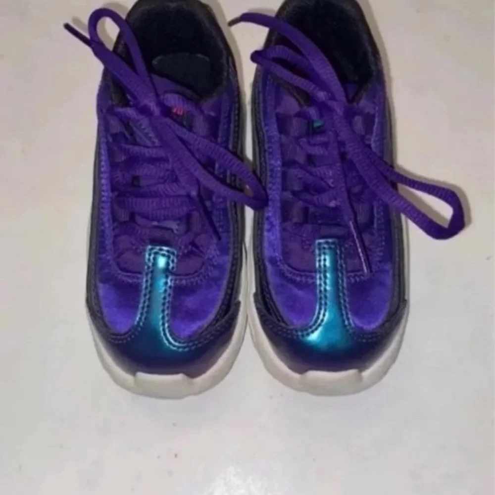 Baby boy air max Nike shoes. Size 8
Purple/green/blue I - Picture 2 of 7